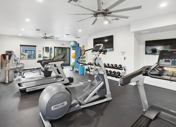 Community Fitness Center with Equipment at Ridgeline Apartments in Tucson, AZ.