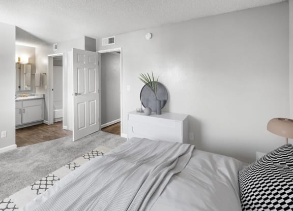 Model bedroom with queen bed