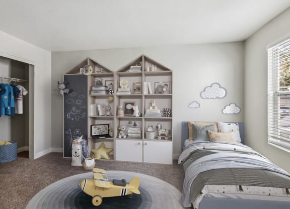 Model bedroom with a bed and a bookcase