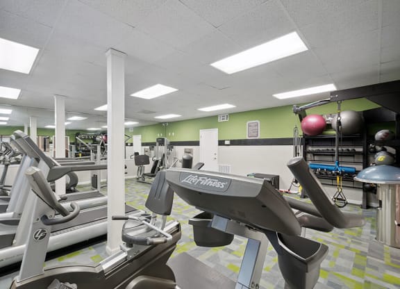 Community Fitness Center with Equipment at Westland Park Apartments in Jacksonville, FL.