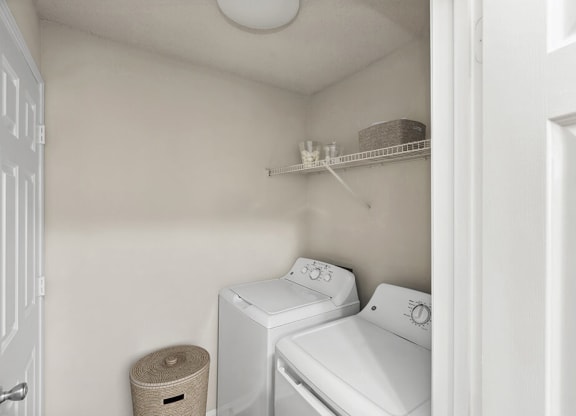 Model Laundry Room with Washer & Dryer hook up at Shadow Ridge Apartments in Riverdale, GA.