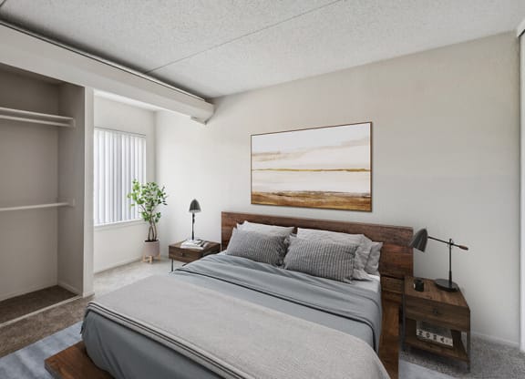 Model Bedroom with Carpet, Closet & Window View at Mason Van Dorn Apartments located in Alexandria, VA.