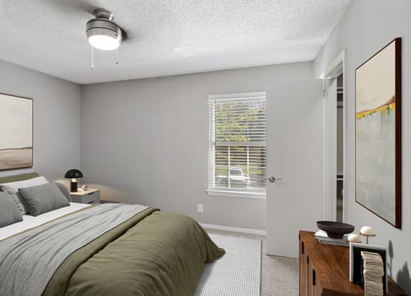 Model Bedroom with Carpet at Abbington Heights Apartments in Antioch, TN.