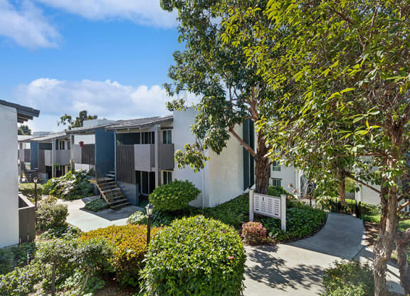 Exterior Community Building and Landscape at Colonnade at Fletcher Hills Apartments in El Cajon, CA.