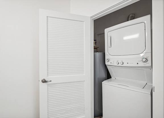 Model Laundry Room with Washer & Dryer at Stella Apartments located in New Carrollton, MD.
