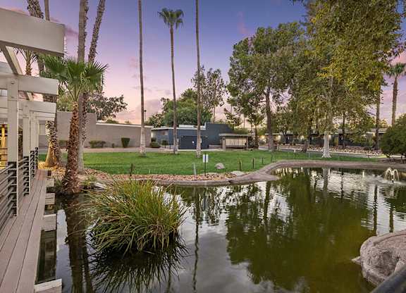 Community Pond and Landscape at Lakeside Casitas Apartments located in Tucson, AZ.