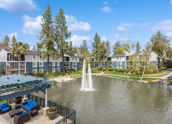 Exterior Community Buildings and Fountain at Fountains at Point West Apartments in Sacramento, CA.