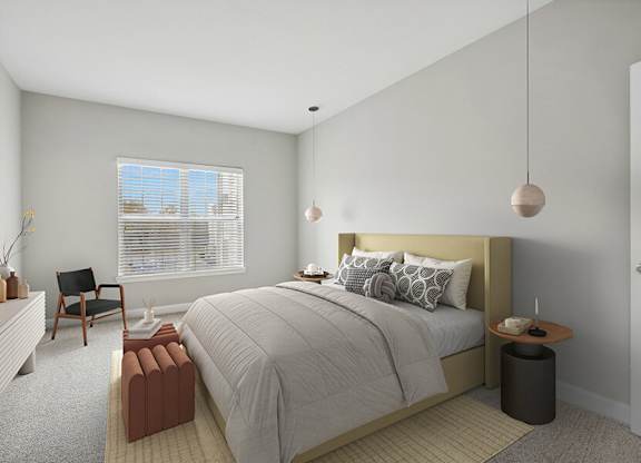 Model Bedroom with Carpet and Window View at Dulles Green Apartments located in Herndon, VA.