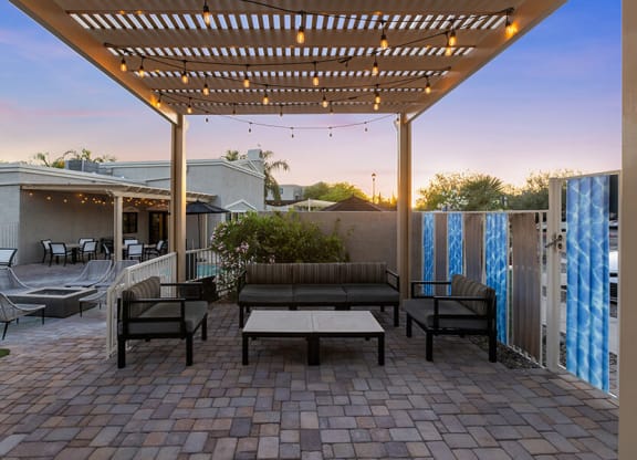 Outdoor Patio Area with Lounge Furniture at Ridgeline Apartments in Tucson, AZ.