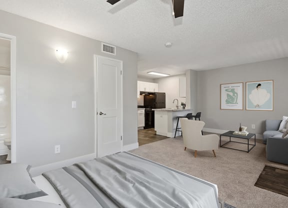 Model Studio Bedroom with Carpet at Stillwater Apartments in Glendale, AZ.