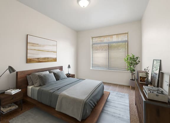 Model Bedroom with Carpet and Window View at Altitude on Fifth Apartments in Salt Lake City, UT.