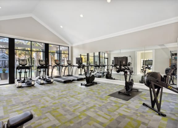 Indoor Fitness Center Treadmills and Stationary Bikes at Caribbean Breeze Apartments in Tampa, FL.