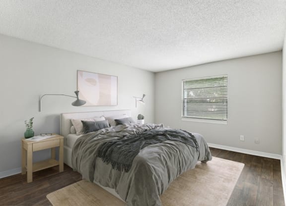 Model bedroom with queen-size bed