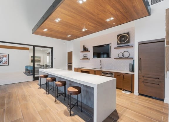 Community kitchen area with bar