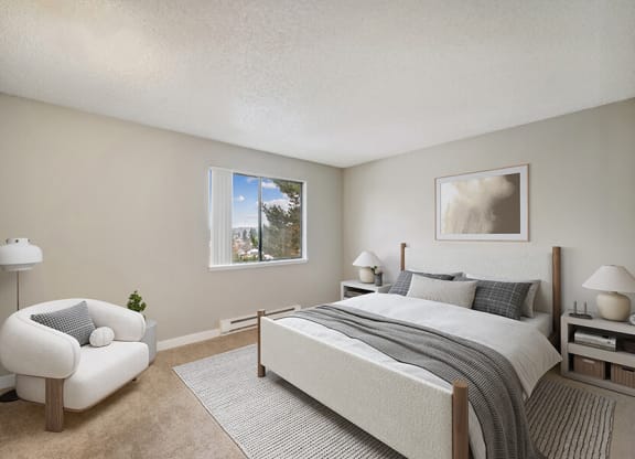 Model Bedroom with Carpet and Window View at Grammercy Apartments located in Renton, WA.