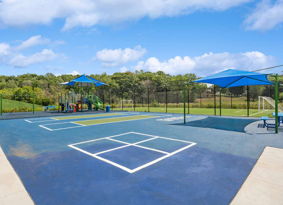 Community Sports Court and Playground Area at Elevate on Parkway Apartments, Minnesota, 55337 