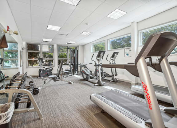 Fitness center interior with cardio equipment