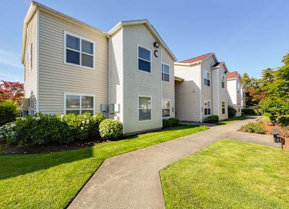 Exterior Community Building and Landscape at Landings at Morrison Apartments located in Gresham, OR.