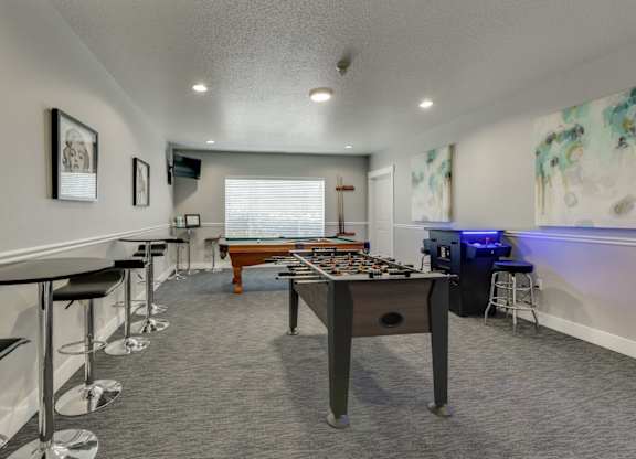 Community Clubhouse with Game Tables at Landings at Morrison Apartments located in Gresham, OR.