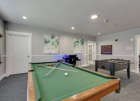 Community Clubhouse with Game Tables at Landings at Morrison Apartments located in Gresham, OR.