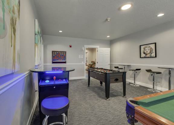 Community Clubhouse with Game Tables at Landings at Morrison Apartments located in Gresham, OR.