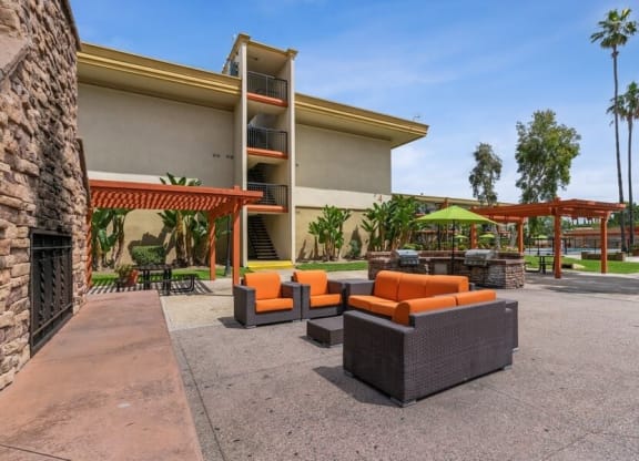 Outdoor lounge area with couches