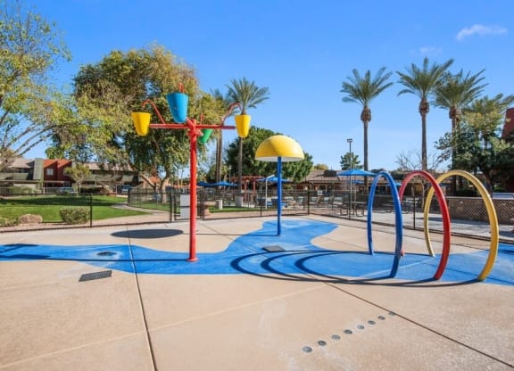 Playground area with basketball hoops at Saratoga Ridge, Phoenix, Arizona