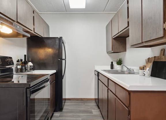 Model Classic Unit Kitchen with Wood-Style Flooring  at Elevate on Parkway, Burnsville
