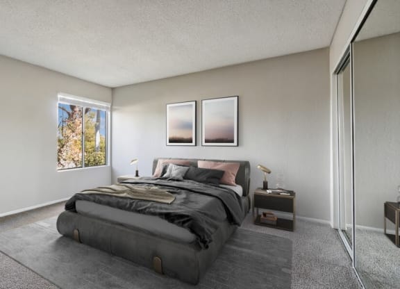 Model Bedroom with Carpet & Window View at Forest Park Apartments in El Cajon, CA.
