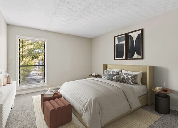 Model Bedroom with Carpet and Window View at Lakeside Retreat Apartments located in Peachtree Corners, GA.