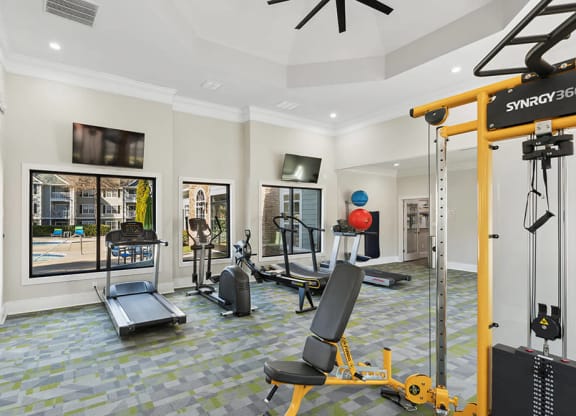 Community Fitness Center with Equipment at Shadow Ridge Apartments in Riverdale, GA.