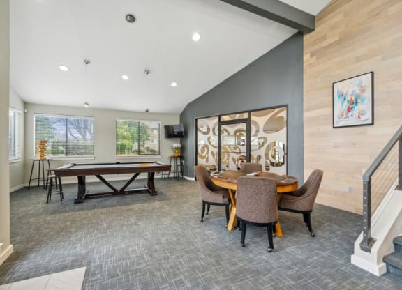 Community lounge area with billiards table