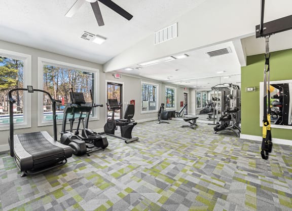 Community Fitness Center with Equipment at Paramont Apartments in Duluth, GA.