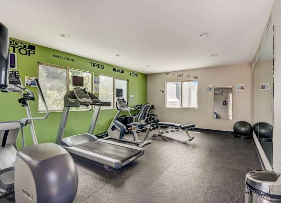 Community Fitness Center with Equipment at Cove La Mesa Apartments located in La Mesa, CA.