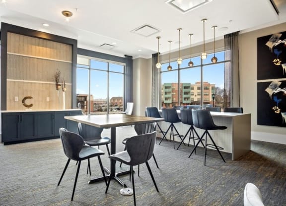 Bar table area with large windows