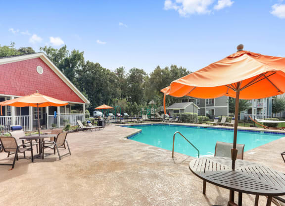 Poolside cabanas and picnic tables