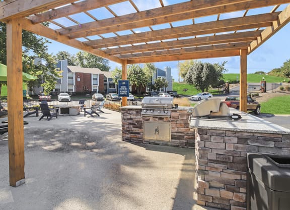 Outdoor BBQ Area with Furniture at Abbington Heights Apartments in Antioch, TN.