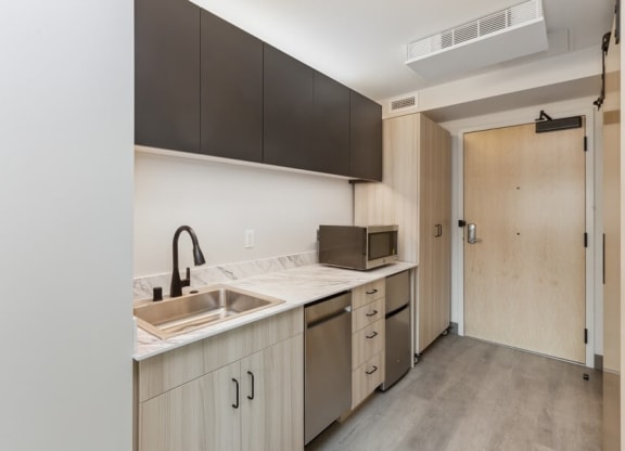 Model kitchen space with dishwasher