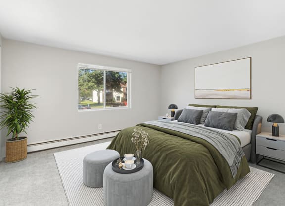 Model bedroom with queen bed