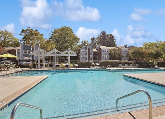Community Swimming Pool with Pool Furniture at Abbington Heights Apartments in Antioch, TN.