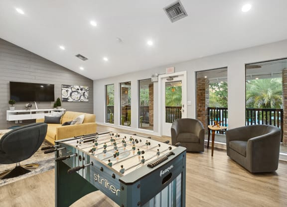 Community Clubhouse Game Tables at Grand Pavilion Apartments in Tampa, FL.