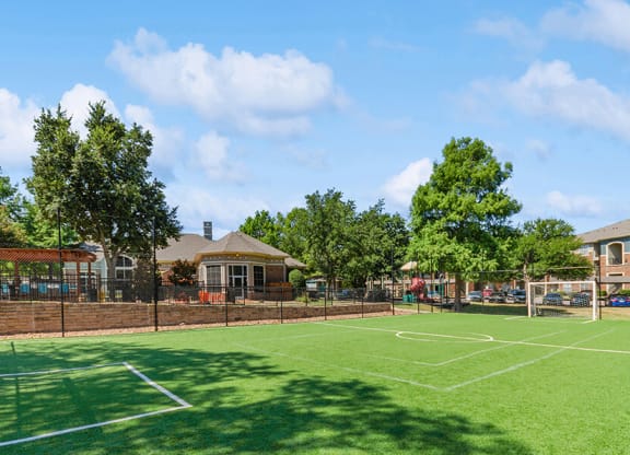 Community Soccer Field with Nets at Belmont at Duck Creek Apartments in Garland, TX.