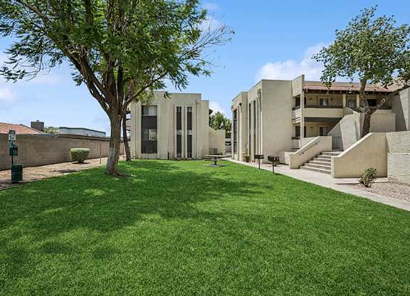 Exterior Community Building and Landscape at Butler Ridge Apartments located in Glendale, AZ.
