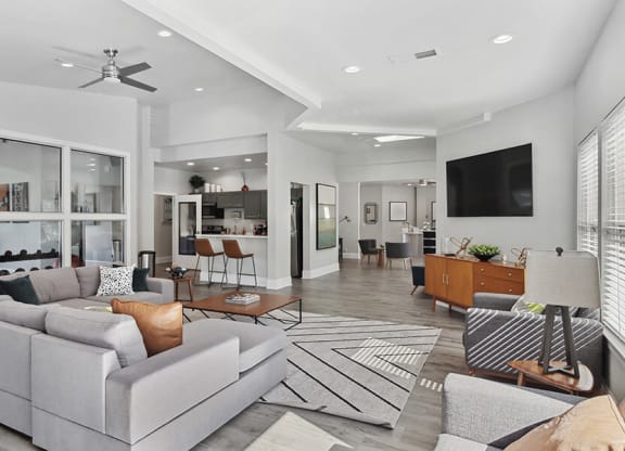 Community Clubhouse with Lounge Furniture and Kitchenette Area at Abbington Heights Apartments in Antioch, TN.