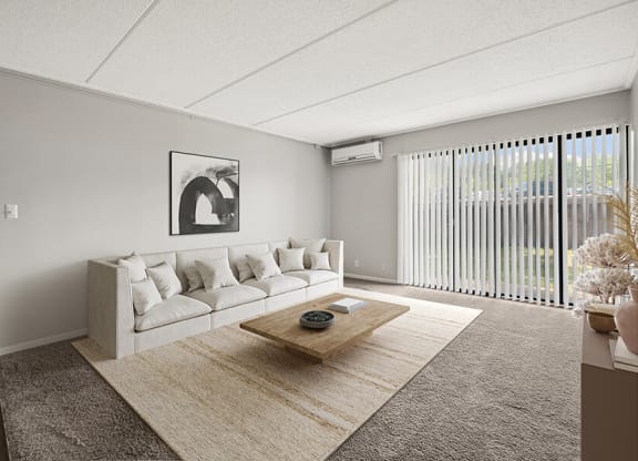 Model Living Room with Carpet and Patio Accessibility at Elevate on Parkway Apartments, Burnsville, MN