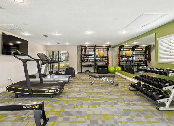 Spacious fitness center with treadmills and other exercise equipment