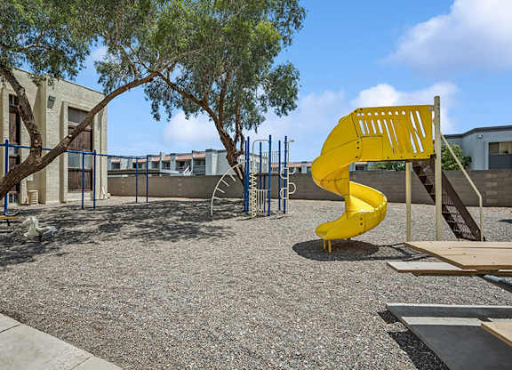 Community Playground and Picnic Tables at Butler Ridge Apartments located in Glendale, AZ.