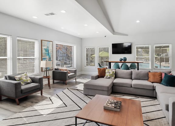 Community Clubhouse with Lounge Furniture and TV at Abbington Heights Apartments in Antioch, TN.
