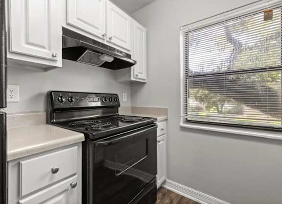Model kitchen at Oasis at Bayside Apartments in Largo, FL