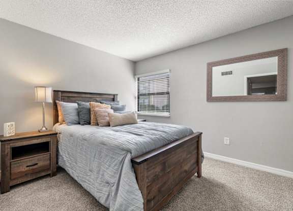 Model bedroom at Oasis at Bayside Apartments in Largo, FL